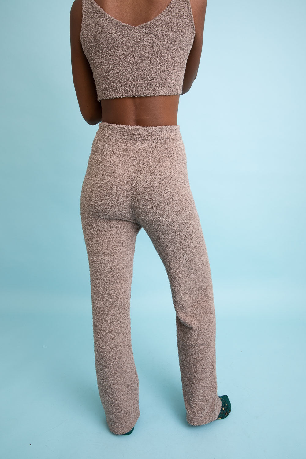 Cozy Boucle Lounge Pants in various colors, showcasing their soft texture and stylish design.