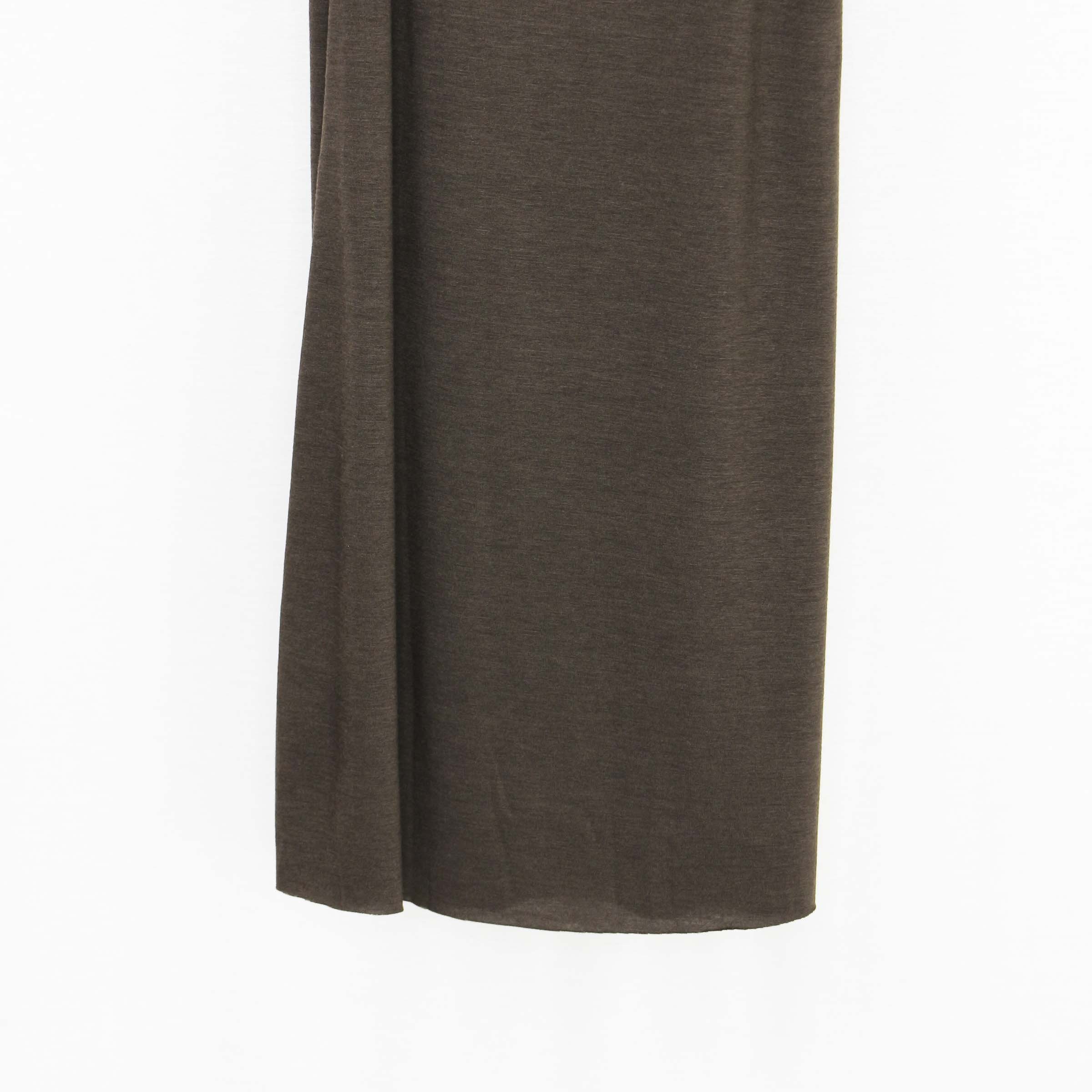 Brown elastic waist wide leg pants displayed on a hanger, showcasing their stylish design and comfortable fit.