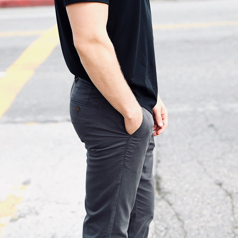 Feel Good Chinos in Faded Black, showcasing a modern slim tapered fit with a soft and breathable fabric.