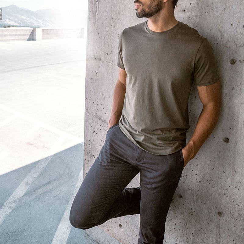 Feel Good Chinos in Faded Black, showcasing a modern slim tapered fit with a soft and breathable fabric.