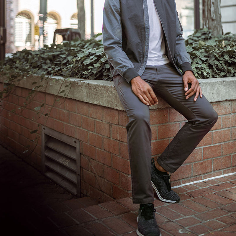 Feel Good Chinos in Faded Black, showcasing a modern slim tapered fit with a soft and breathable fabric.