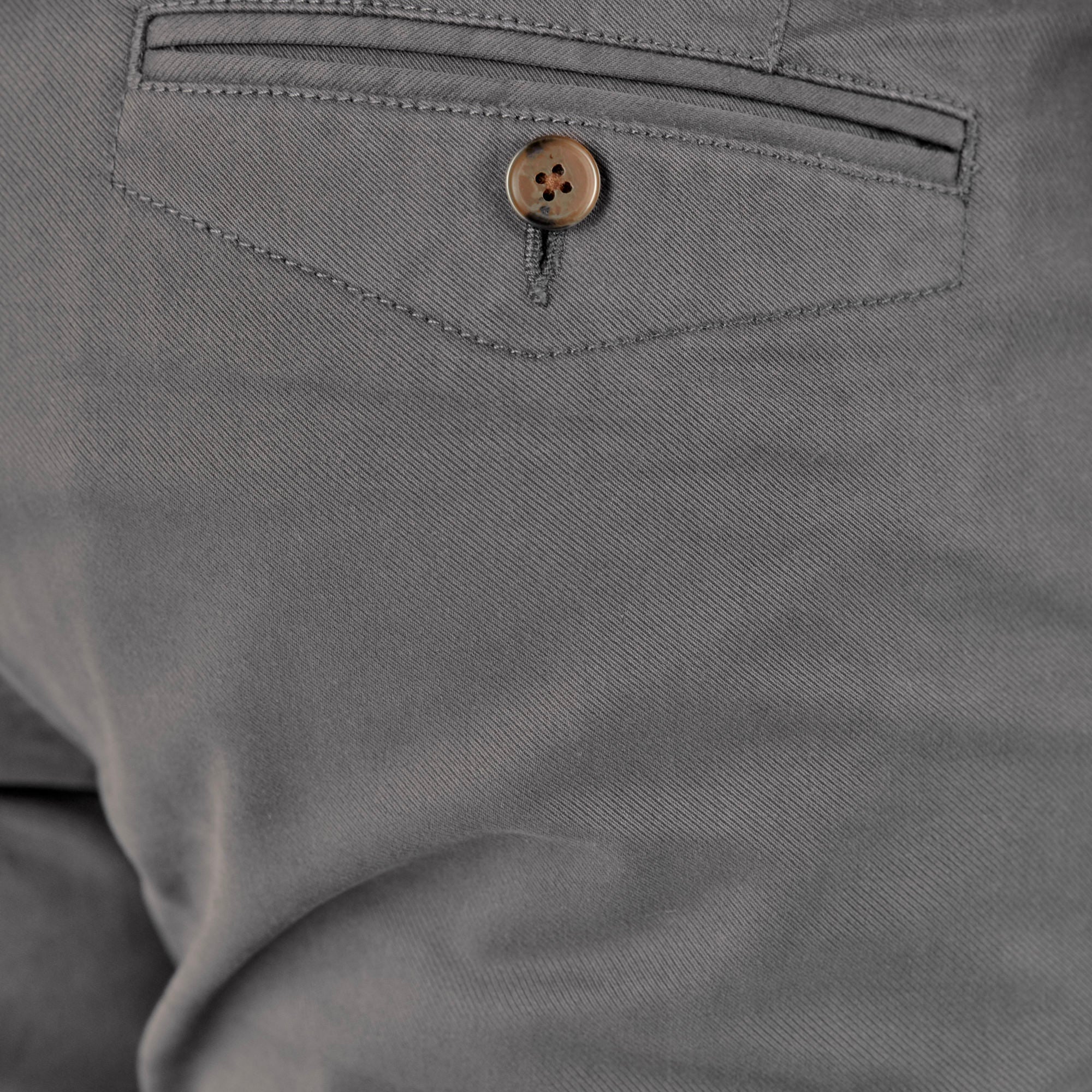 Feel Good Chinos in Faded Black, showcasing a modern slim tapered fit with a soft and breathable fabric.