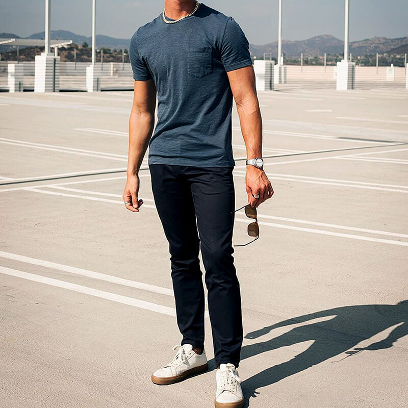 A pair of stylish Feel Good Solid Black Chinos displayed on a neutral background, showcasing their slim tapered fit and soft fabric.