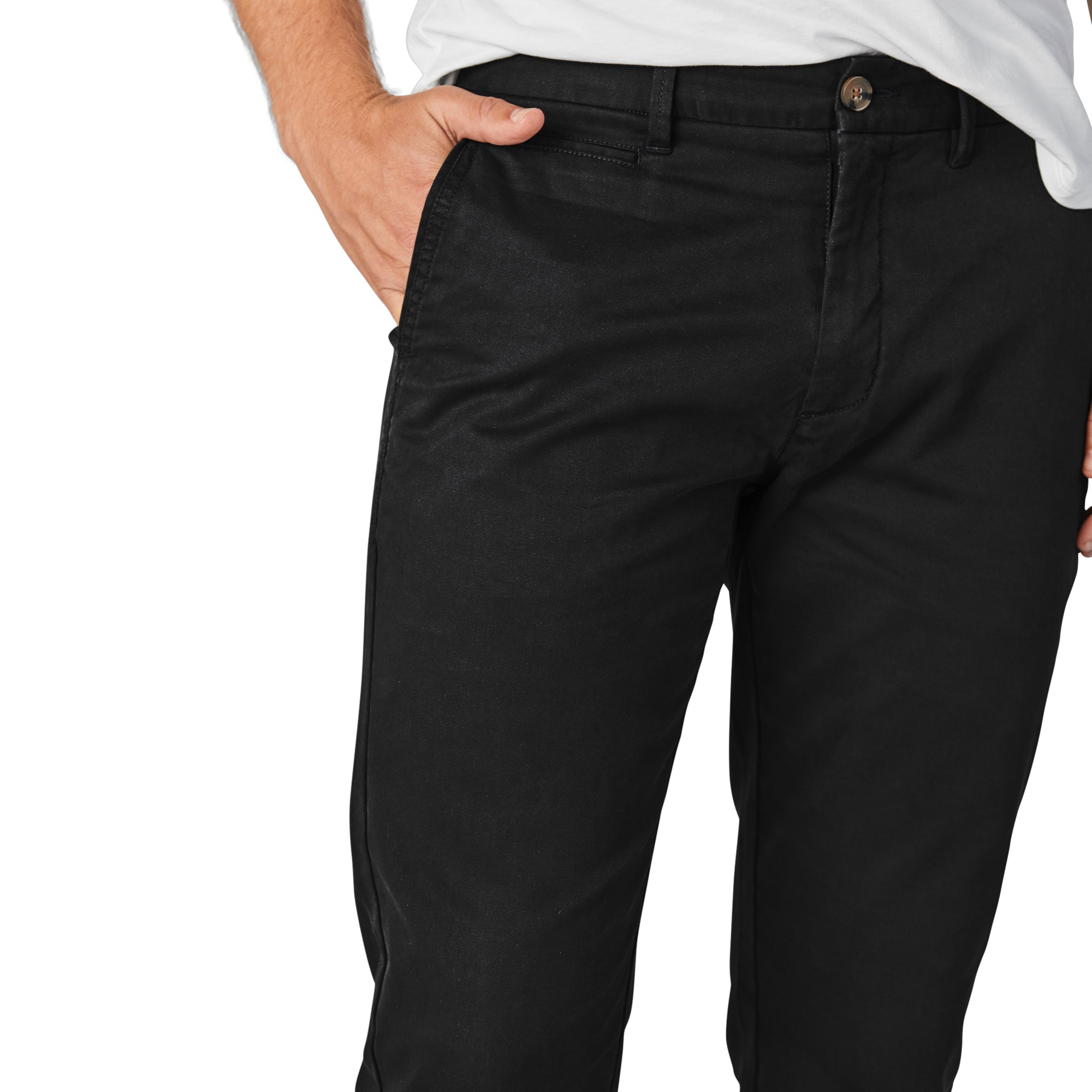 A pair of stylish Feel Good Solid Black Chinos displayed on a neutral background, showcasing their slim tapered fit and soft fabric.