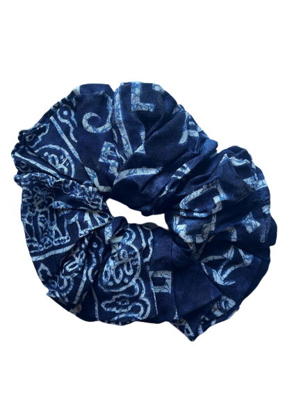 Navy blue hair scrunchie featuring an Amboseli elephant print, made from eco-friendly rayon fabric, showcasing a stylish and sustainable design.