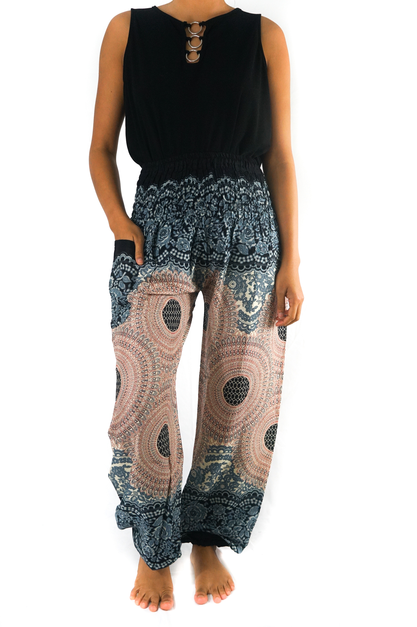 A pair of Pink MANDALA Women Boho Pants featuring a vibrant mandala pattern, elastic waist, and ankle cuffs, perfect for yoga and casual wear.