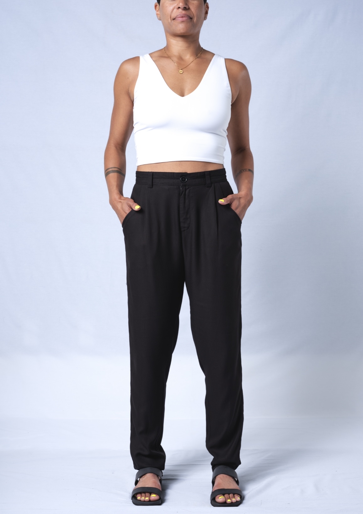 A pair of stylish Professional Joggers featuring a partial elastic waistband, side pockets, and a tapered leg design, made from soft 100% viscose.