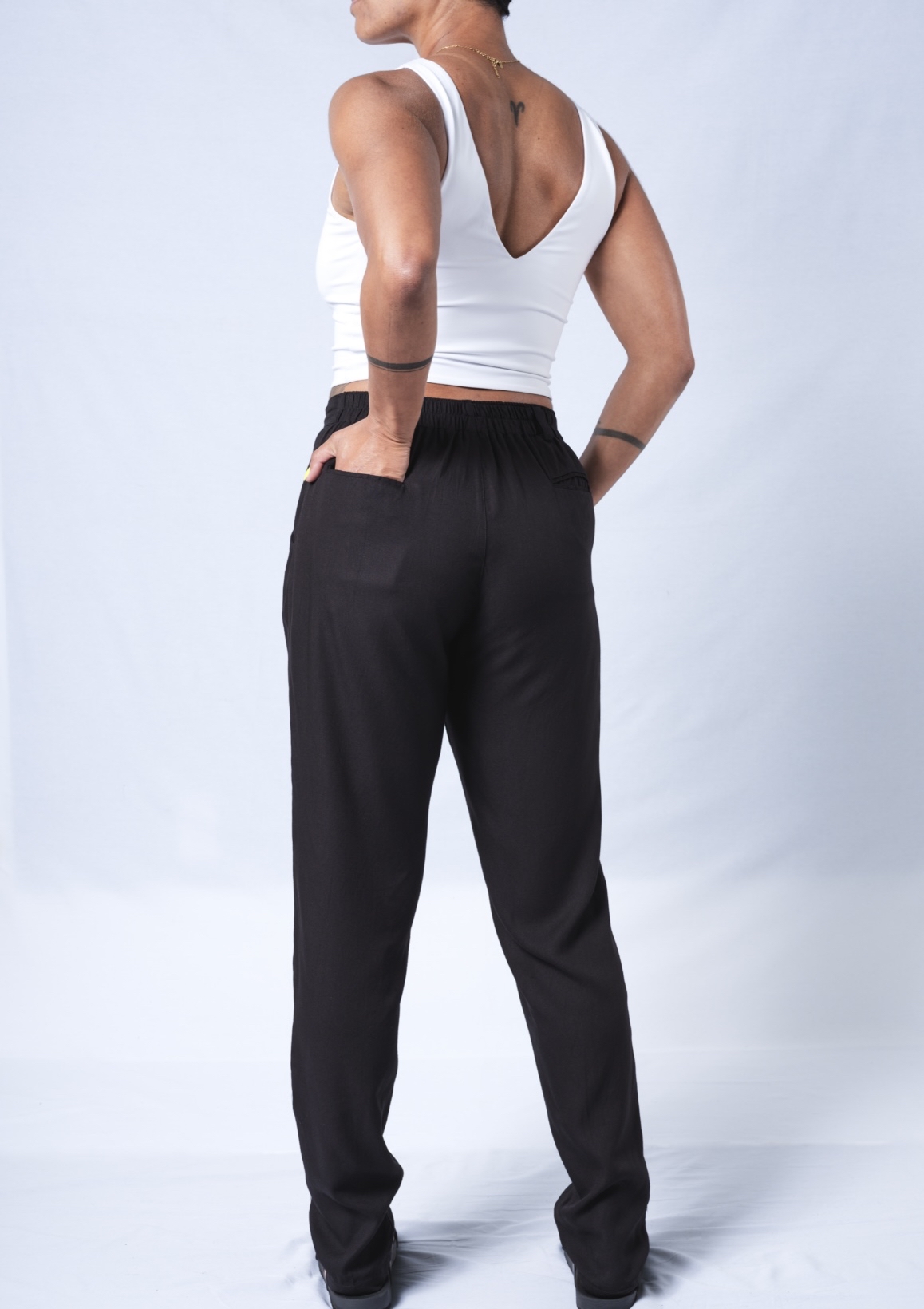 A pair of stylish Professional Joggers featuring a partial elastic waistband, side pockets, and a tapered leg design, made from soft 100% viscose.