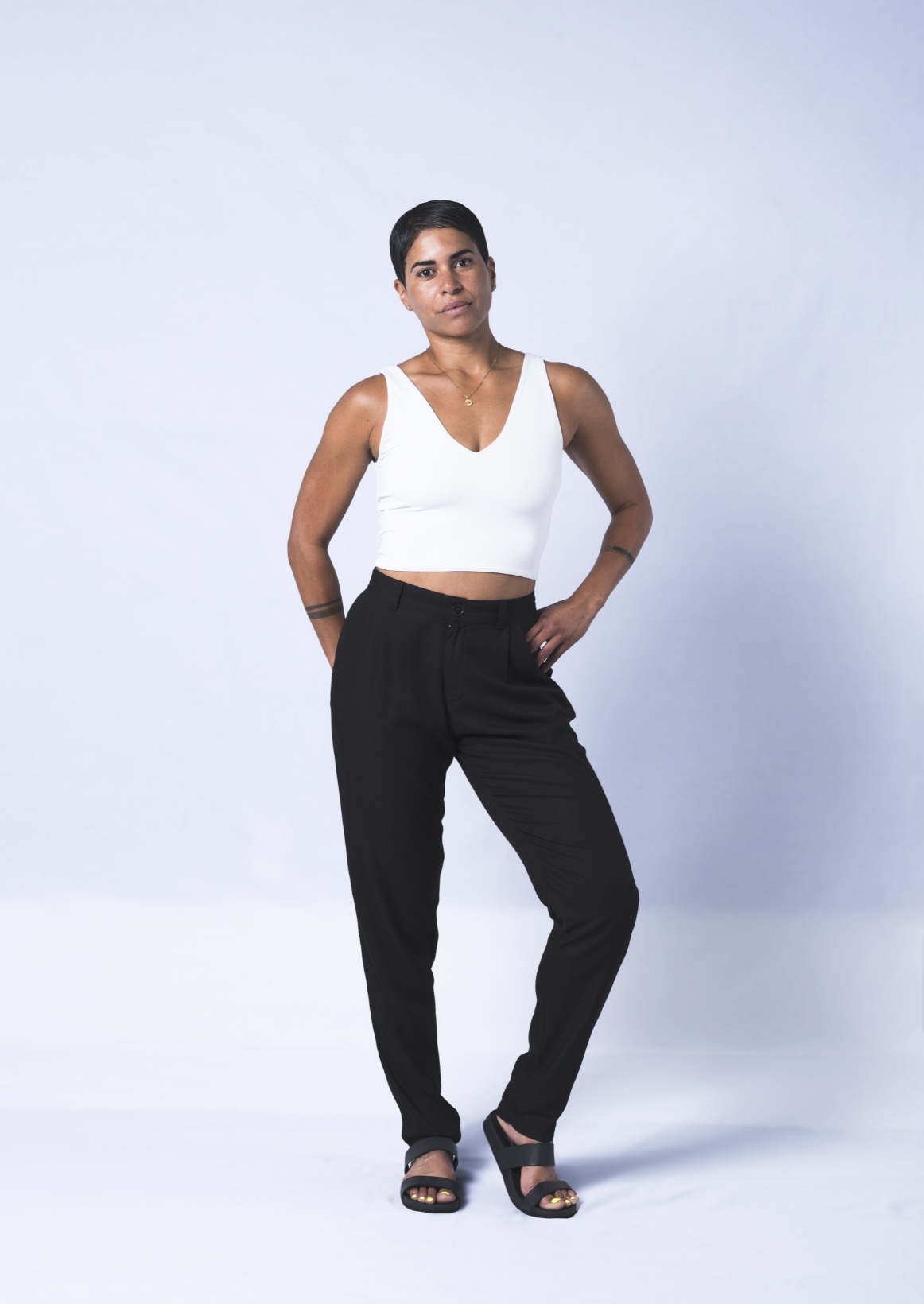 A pair of stylish Professional Joggers featuring a partial elastic waistband, side pockets, and a tapered leg design, made from soft 100% viscose.