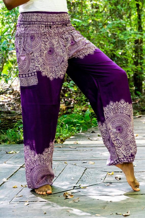 Purple floral boho pants for women, featuring an elastic waist and ankle, made from lightweight rayon, perfect for yoga and casual wear.