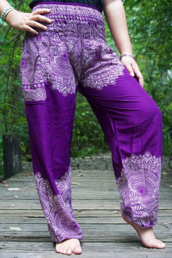 Purple floral boho pants for women, featuring an elastic waist and ankle, made from lightweight rayon, perfect for yoga and casual wear.