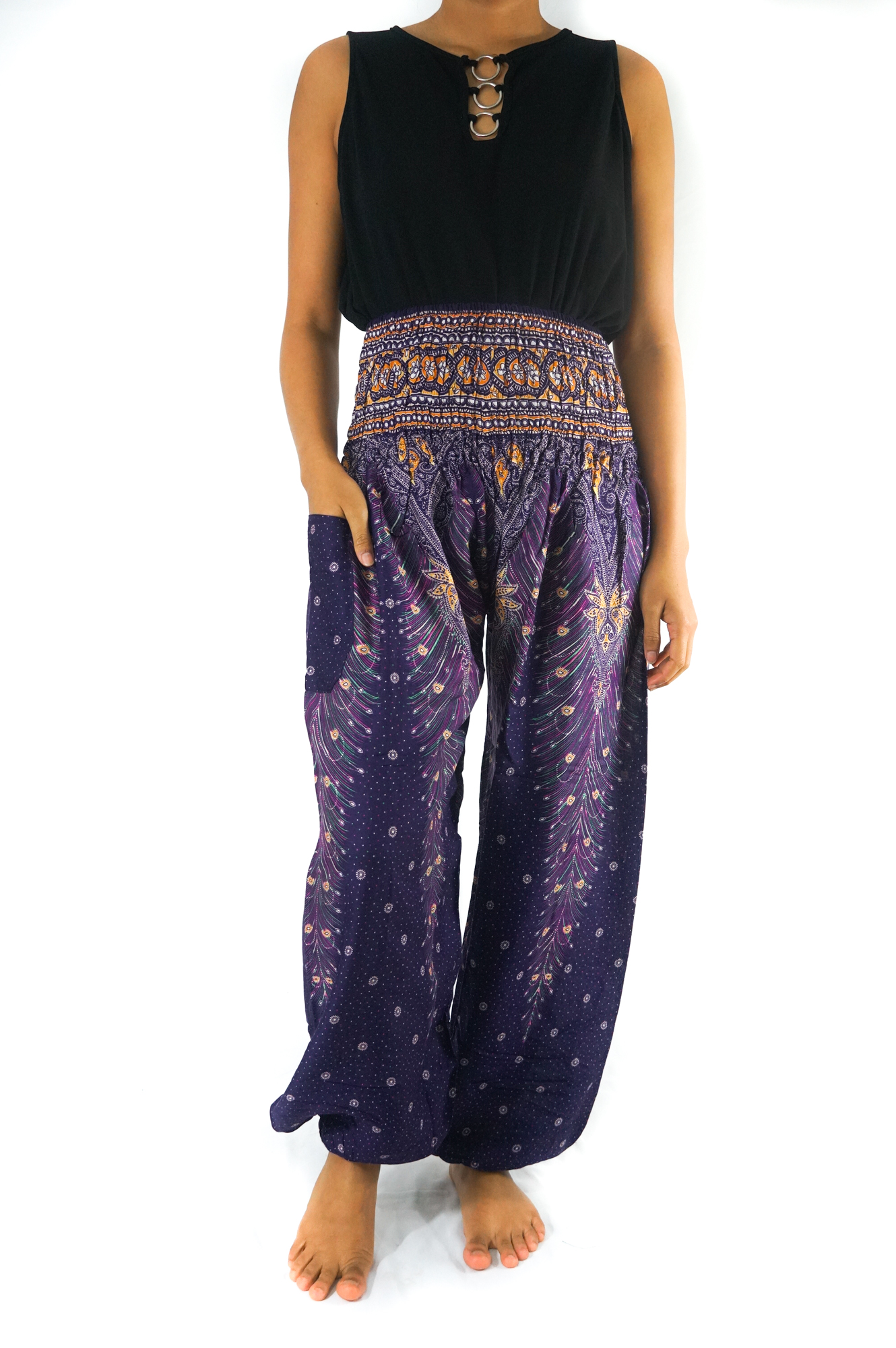 Purple PEACOCK Harem Pants for women, featuring a vibrant peacock print, elastic waist and ankle, and a side pocket, made from lightweight rayon.