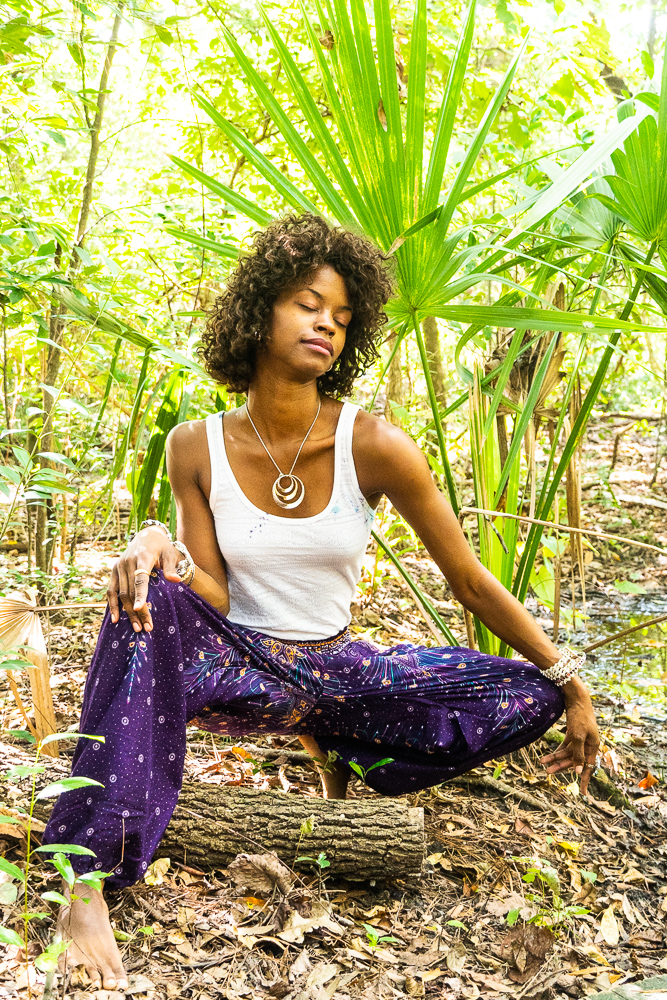 Purple PEACOCK Harem Pants for women, featuring a vibrant peacock print, elastic waist and ankle, and a side pocket, made from lightweight rayon.