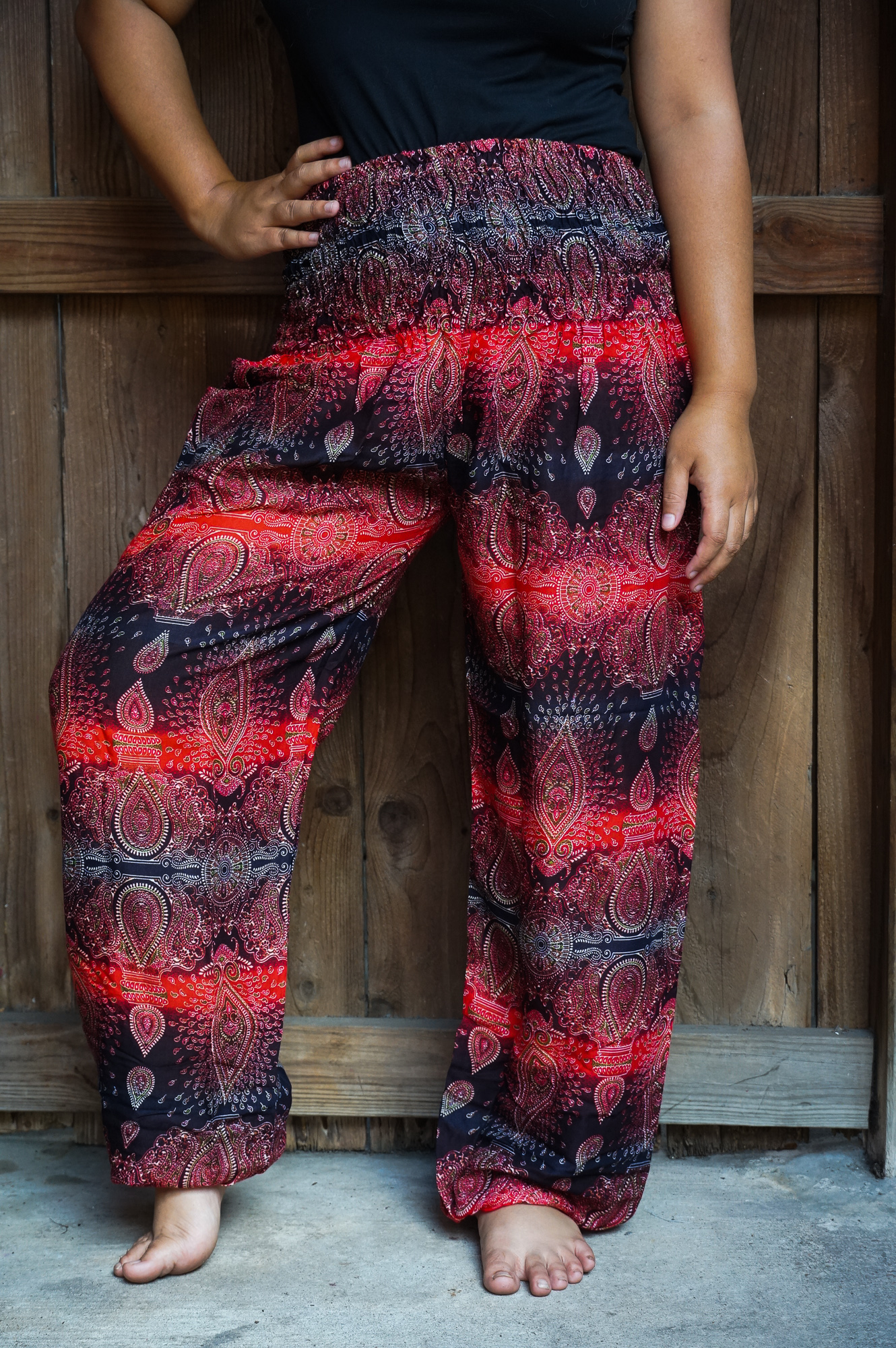 Striped harem pants made of lightweight rayon, featuring an elastic waist and ankle, perfect for boho and hippie styles.