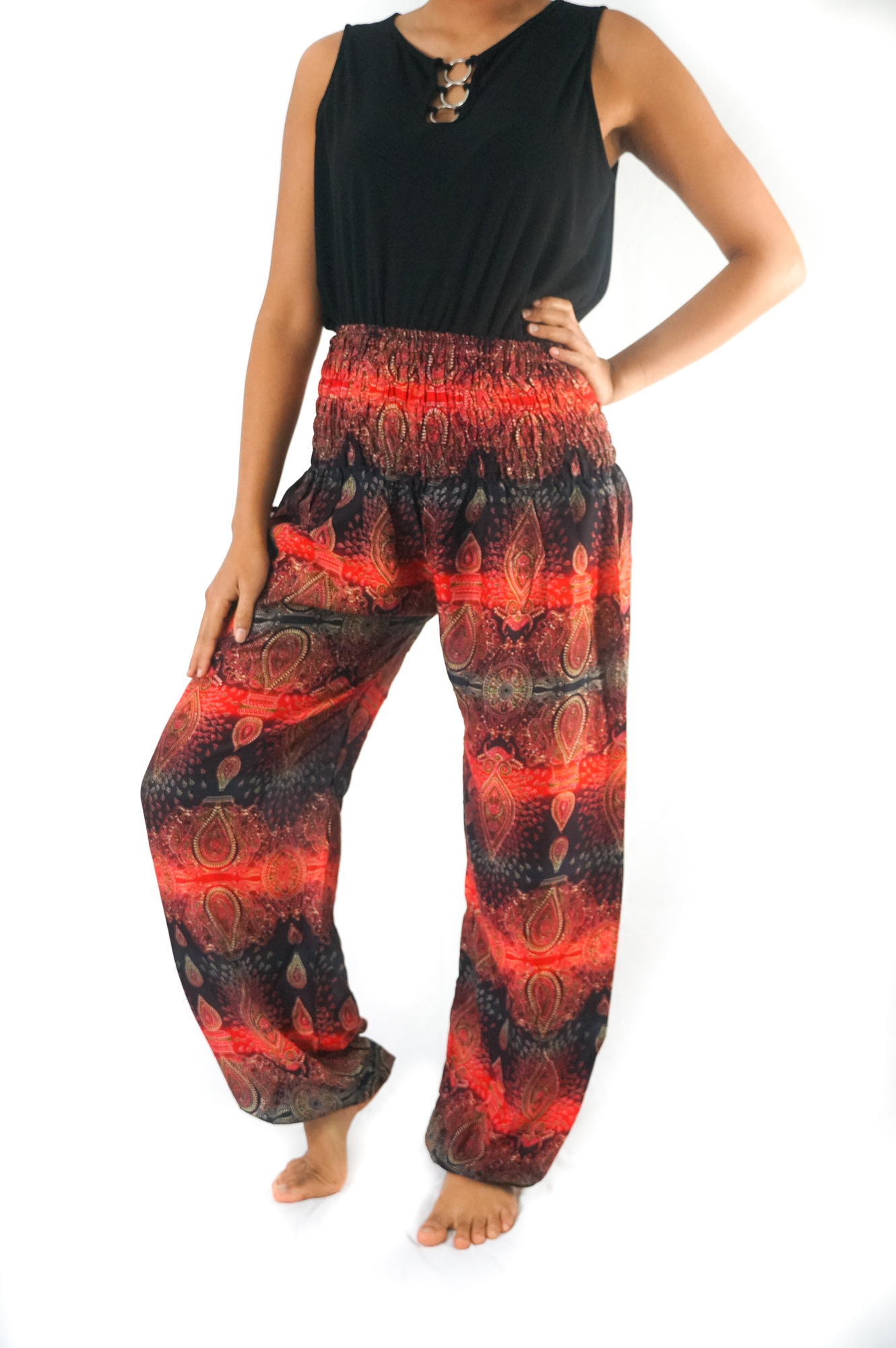 Striped harem pants made of lightweight rayon, featuring an elastic waist and ankle, perfect for boho and hippie styles.