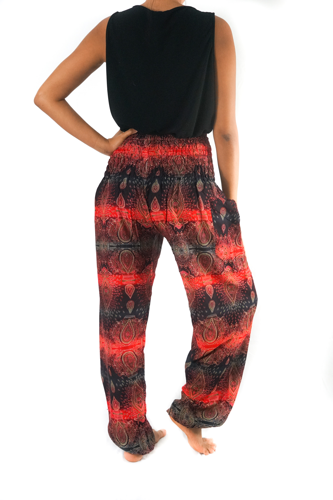 Striped harem pants made of lightweight rayon, featuring an elastic waist and ankle, perfect for boho and hippie styles.