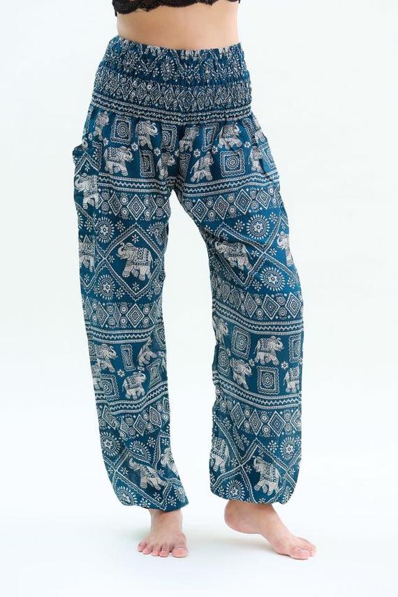 Teal Elephant Pants for women, featuring a bohemian design with elastic waist and ankle, made from breathable rayon fabric, perfect for yoga and casual wear.