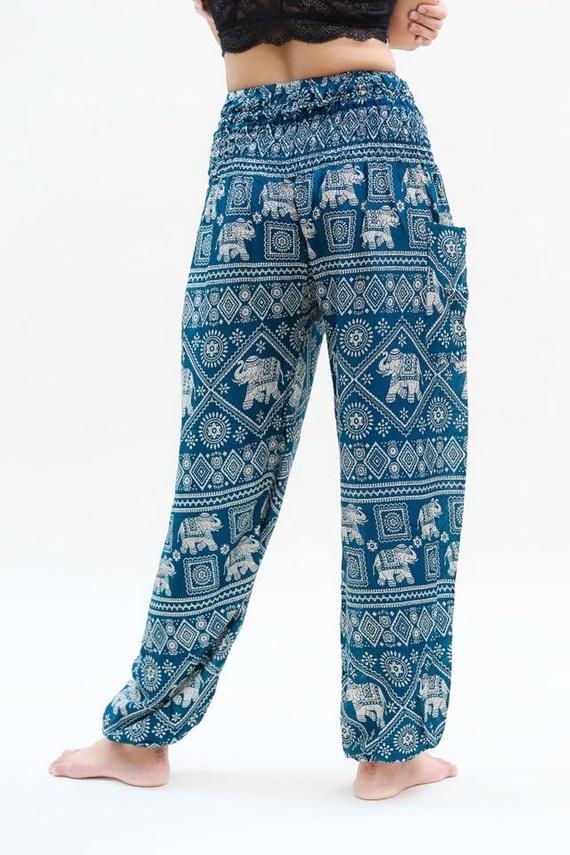 Teal Elephant Pants for women, featuring a bohemian design with elastic waist and ankle, made from breathable rayon fabric, perfect for yoga and casual wear.