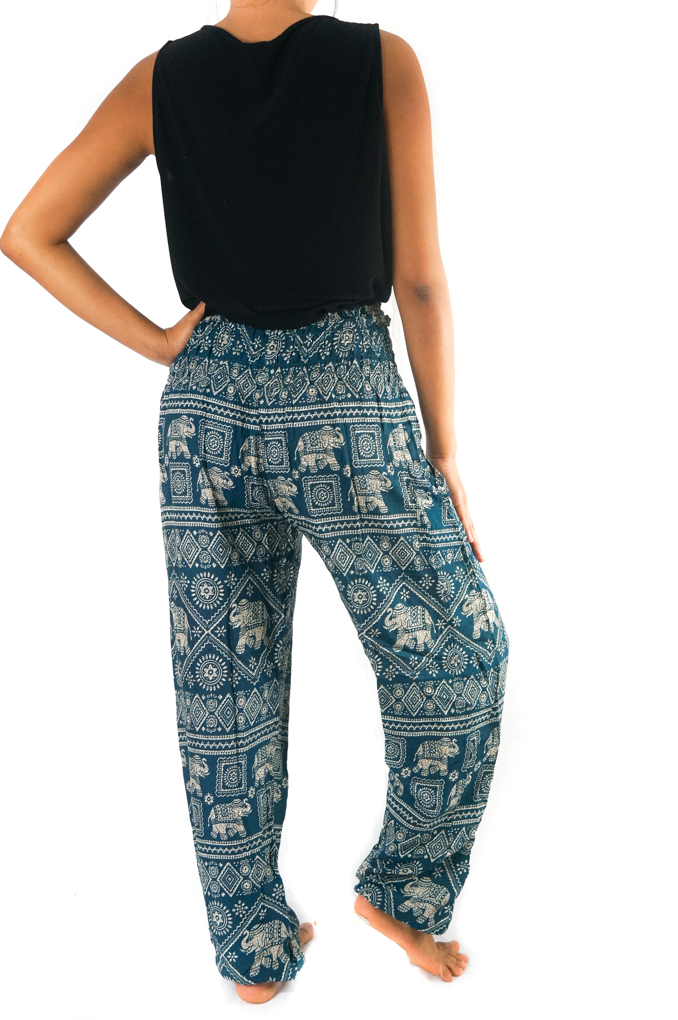 Teal Elephant Pants for women, featuring a bohemian design with elastic waist and ankle, made from breathable rayon fabric, perfect for yoga and casual wear.