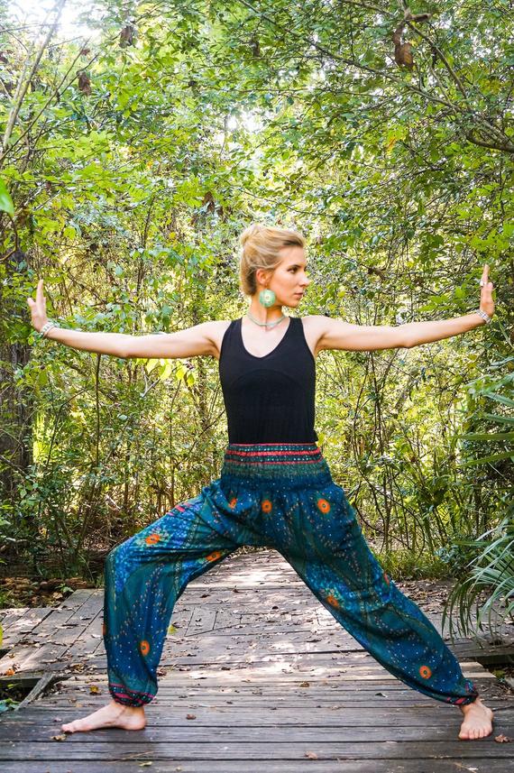 Teal PEACOCK Harem Pants for women, featuring a vibrant peacock print, elastic waist, and ankle design, perfect for boho and hippie styles.