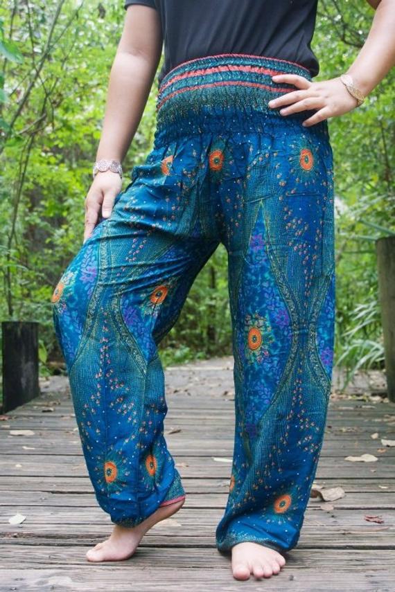 Teal PEACOCK Harem Pants for women, featuring a vibrant peacock print, elastic waist, and ankle design, perfect for boho and hippie styles.