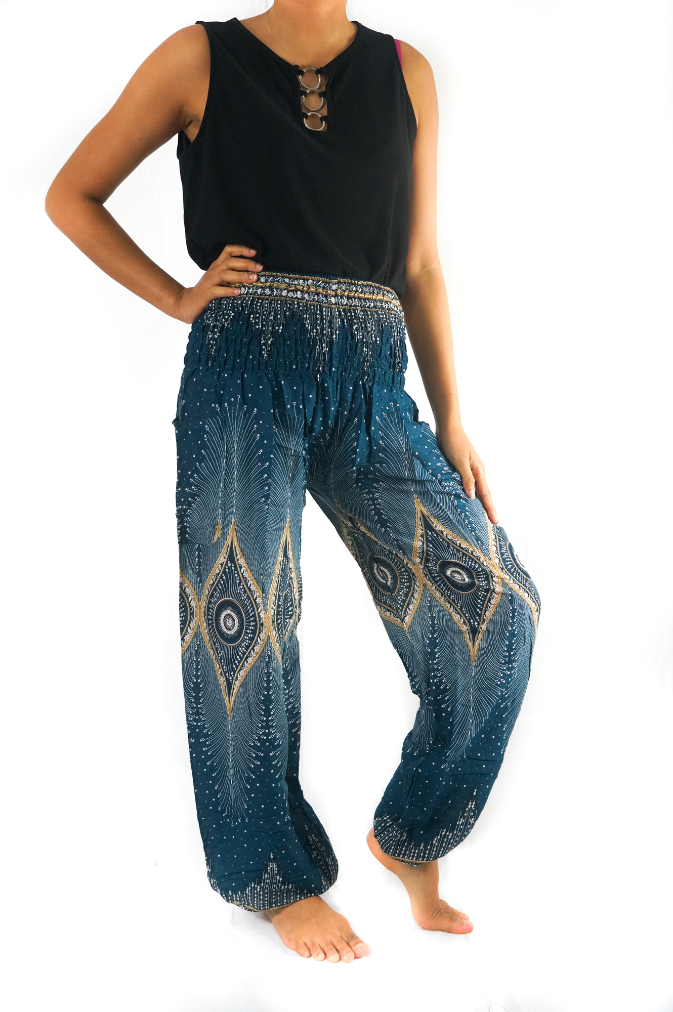 Teal PEACOCK Women Boho Pants featuring a vibrant peacock design, elastic waist, and ankle, made from lightweight breathable rayon fabric.