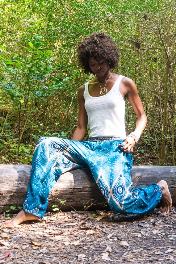 Teal PEACOCK Women Boho Pants featuring a vibrant peacock design, elastic waist, and ankle, made from lightweight breathable rayon fabric.