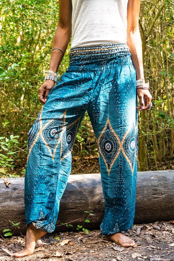 Teal PEACOCK Women Boho Pants featuring a vibrant peacock design, elastic waist, and ankle, made from lightweight breathable rayon fabric.