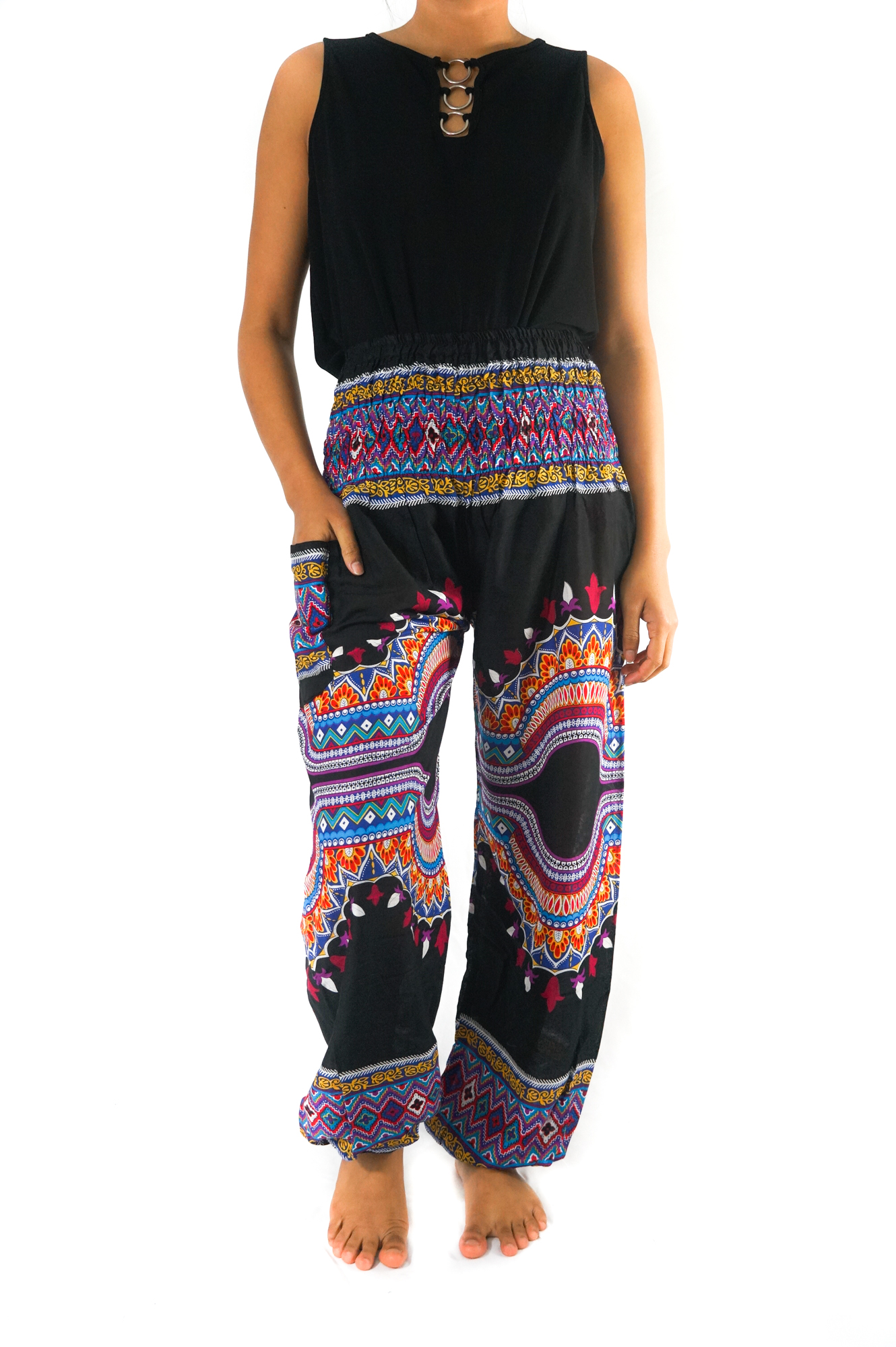 A pair of vibrant Tribal Harem Pants made from 100% rayon, featuring an elastic waist and ankle, perfect for bohemian style and comfort.