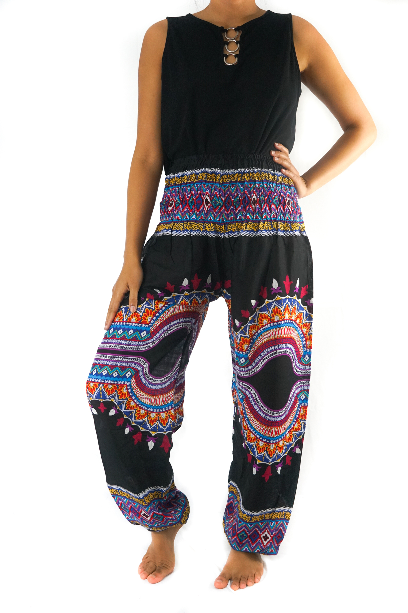 A pair of vibrant Tribal Harem Pants made from 100% rayon, featuring an elastic waist and ankle, perfect for bohemian style and comfort.