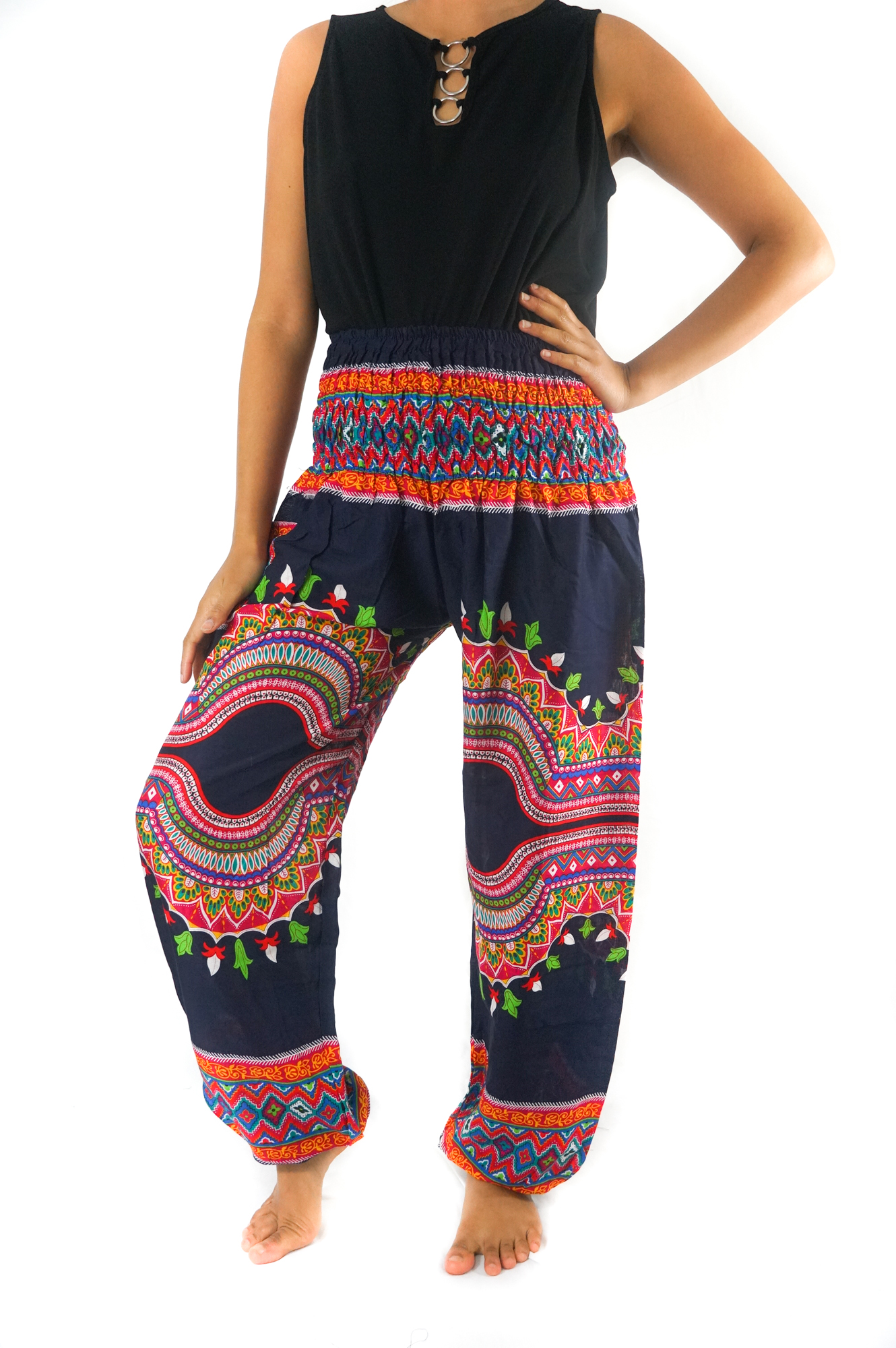 A pair of colorful Tribal Harem Pants made from 100% rayon, featuring an elastic waist and ankle, perfect for a bohemian style.