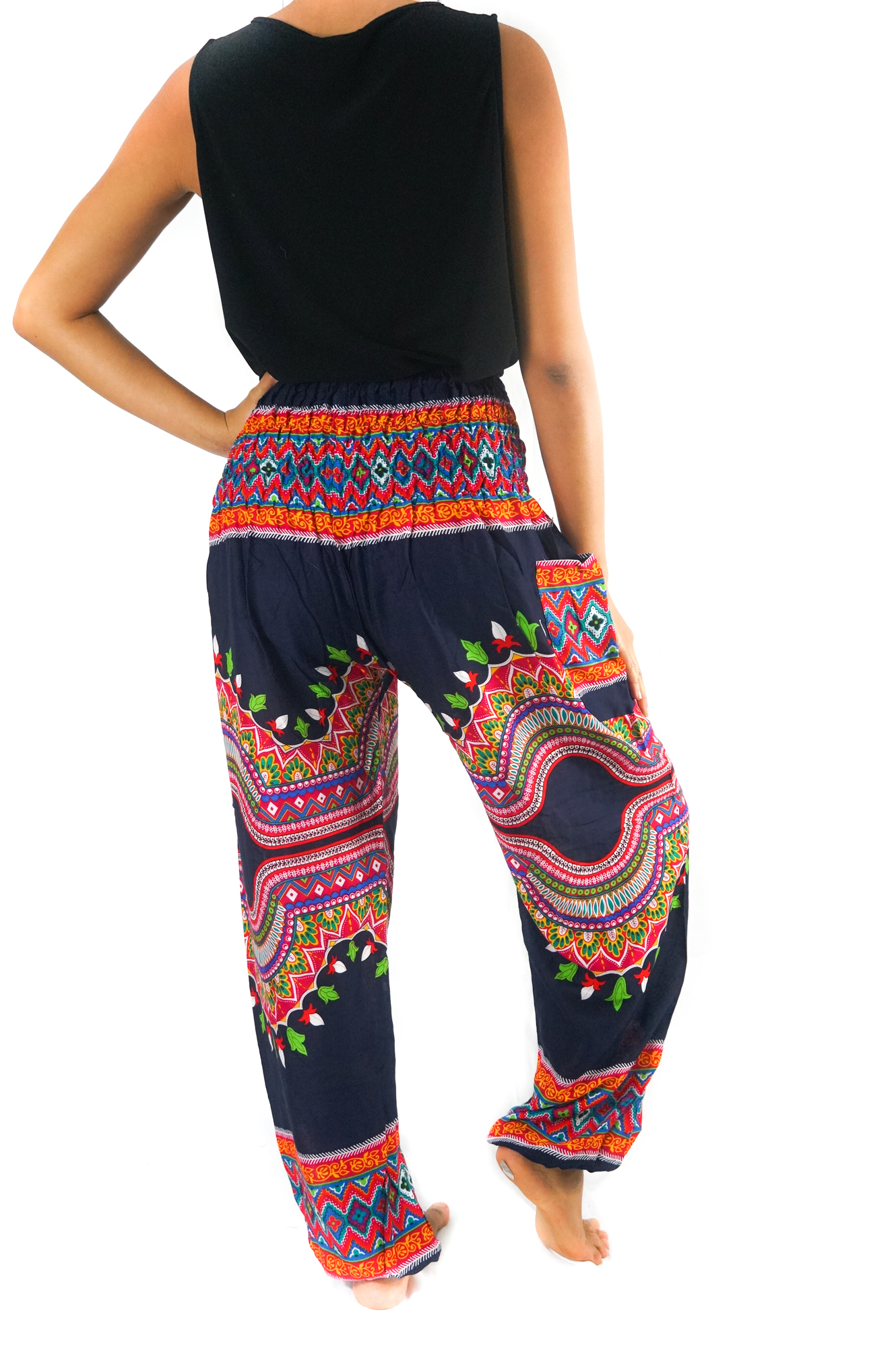 A pair of colorful Tribal Harem Pants made from 100% rayon, featuring an elastic waist and ankle, perfect for a bohemian style.