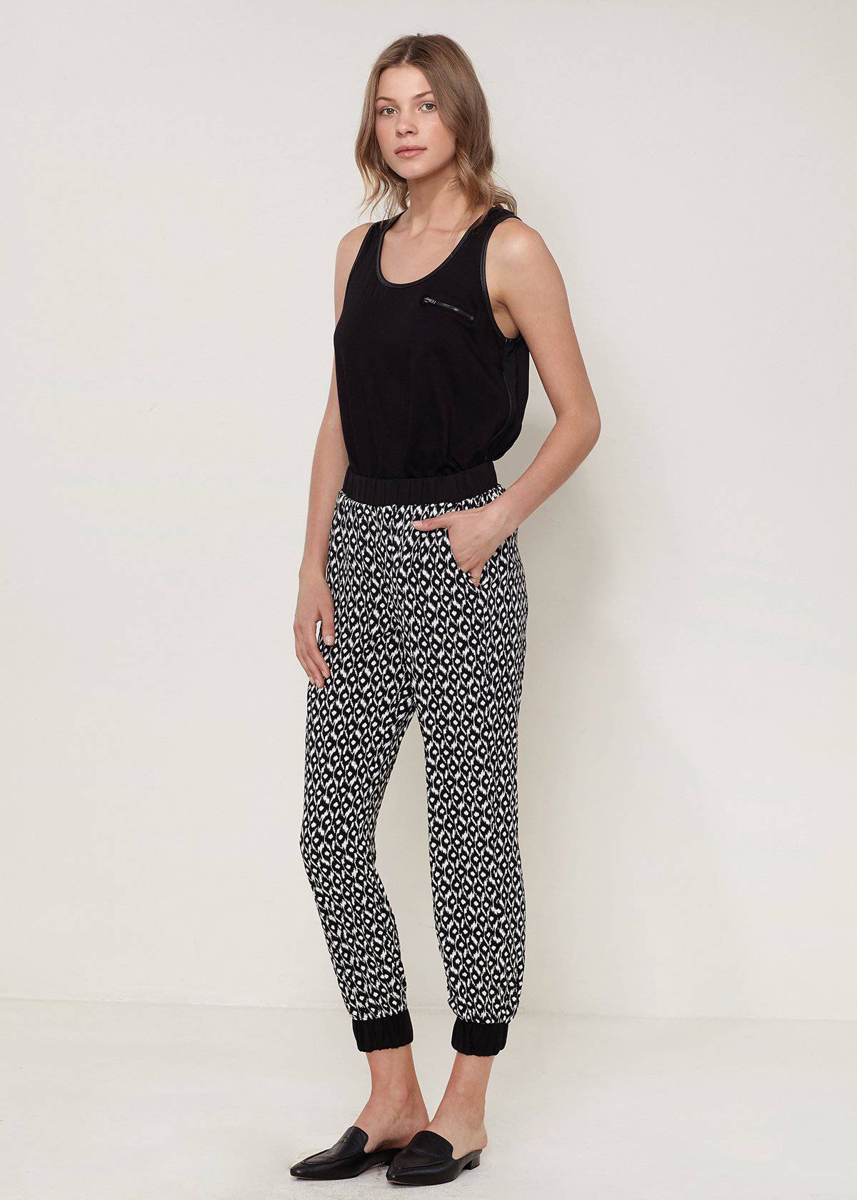 A pair of Women's All Day Jogger Pants featuring an elasticized waist, cuffs, and two side pockets, made from soft 100% polyester.