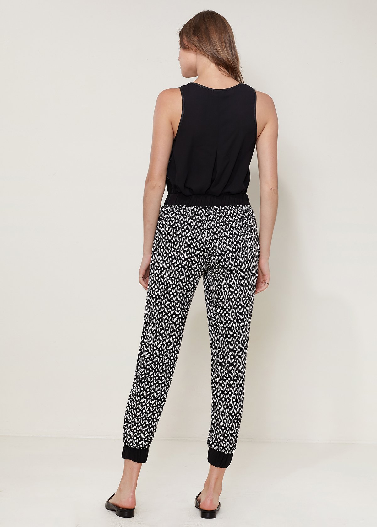 A pair of Women's All Day Jogger Pants featuring an elasticized waist, cuffs, and two side pockets, made from soft 100% polyester.