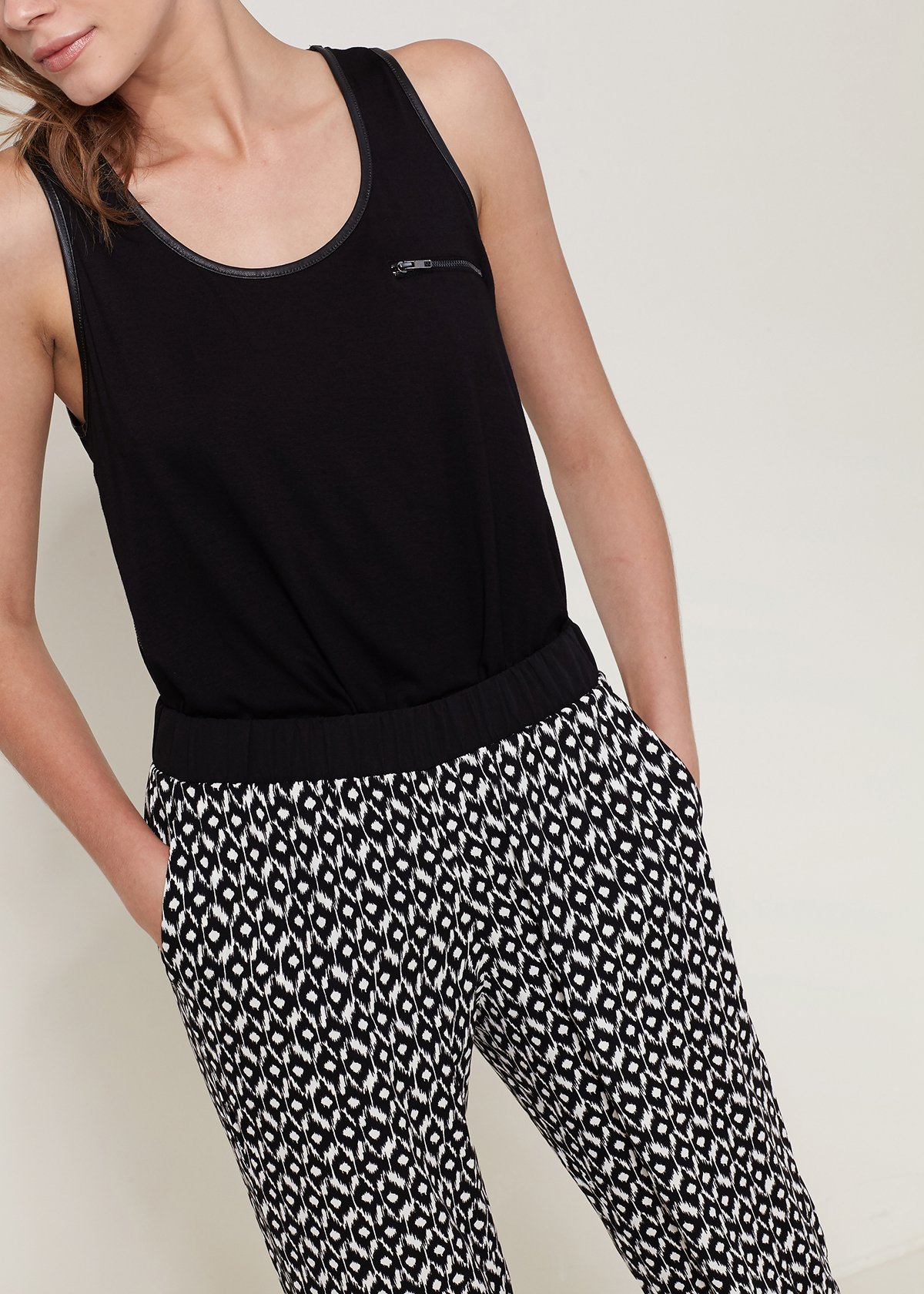 A pair of Women's All Day Jogger Pants featuring an elasticized waist, cuffs, and two side pockets, made from soft 100% polyester.