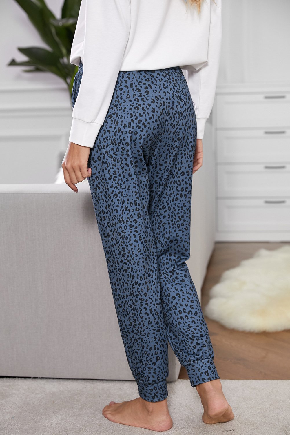 Women's Casual Blue Breezy Leopard Joggers featuring a stylish leopard print, adjustable waist, and relaxed fit, perfect for casual wear.