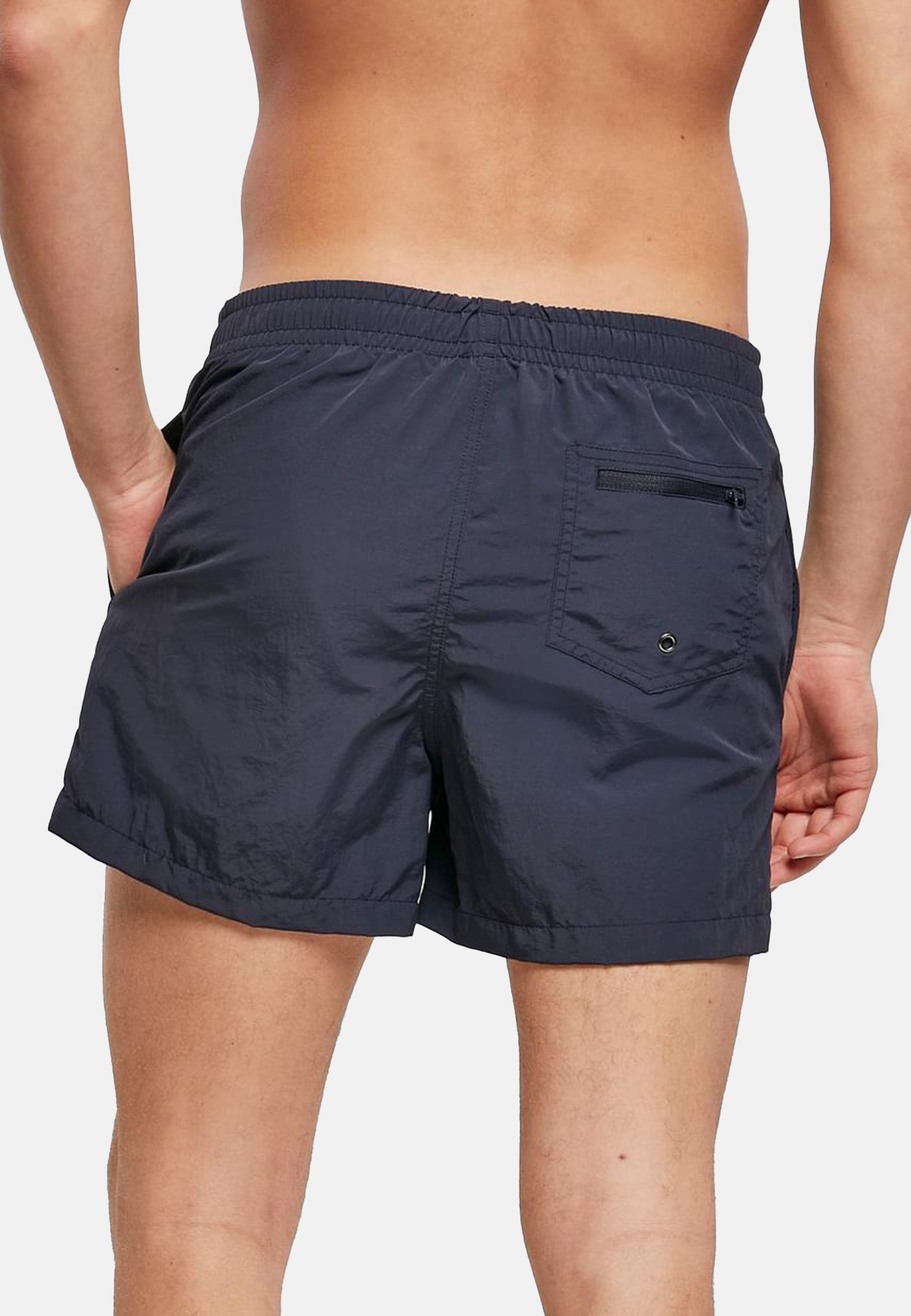 Men's Beach Shorts ICON in four stylish colors, featuring a zippered back pocket and made from lightweight, quick-drying fabric.