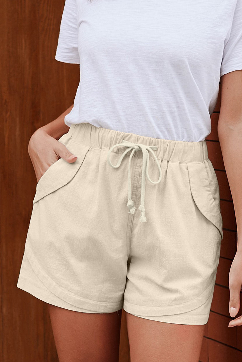 Casual Beige Faylin Women Shorts featuring an elasticised waist, drawstring, and stylish pockets, perfect for summer wear.