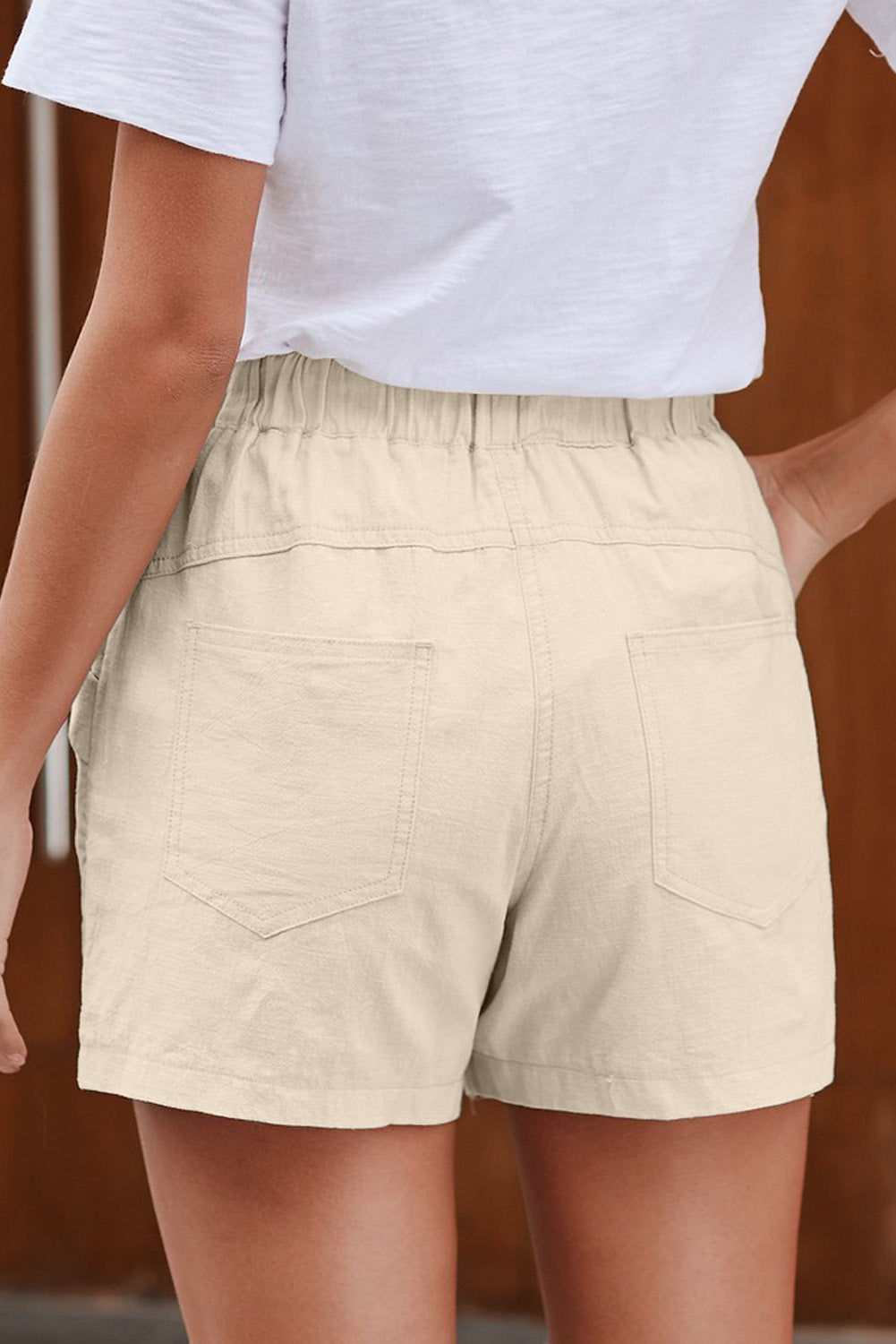 Casual Beige Faylin Women Shorts featuring an elasticised waist, drawstring, and stylish pockets, perfect for summer wear.