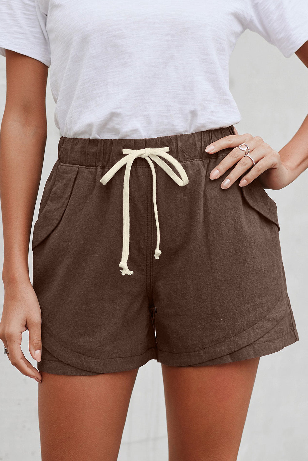 Women Casual Khaki Faylin Linen Shorts featuring an elasticised waist, drawstring, and side pockets, perfect for summer wear.