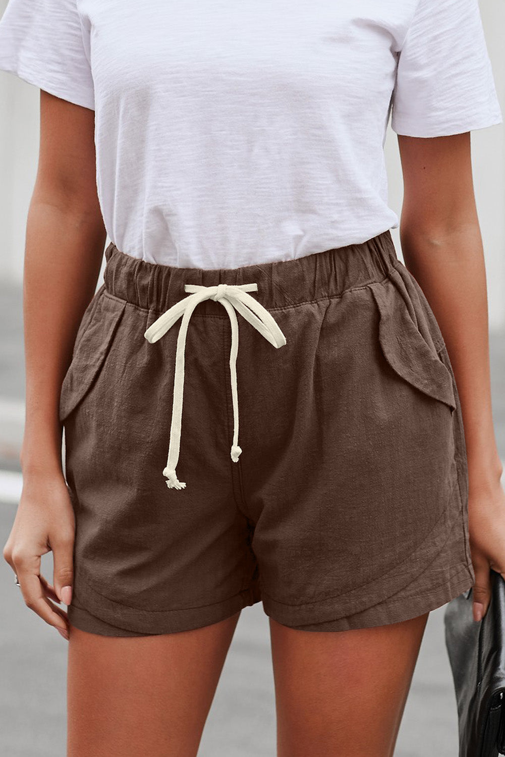 Women Casual Khaki Faylin Linen Shorts featuring an elasticised waist, drawstring, and side pockets, perfect for summer wear.