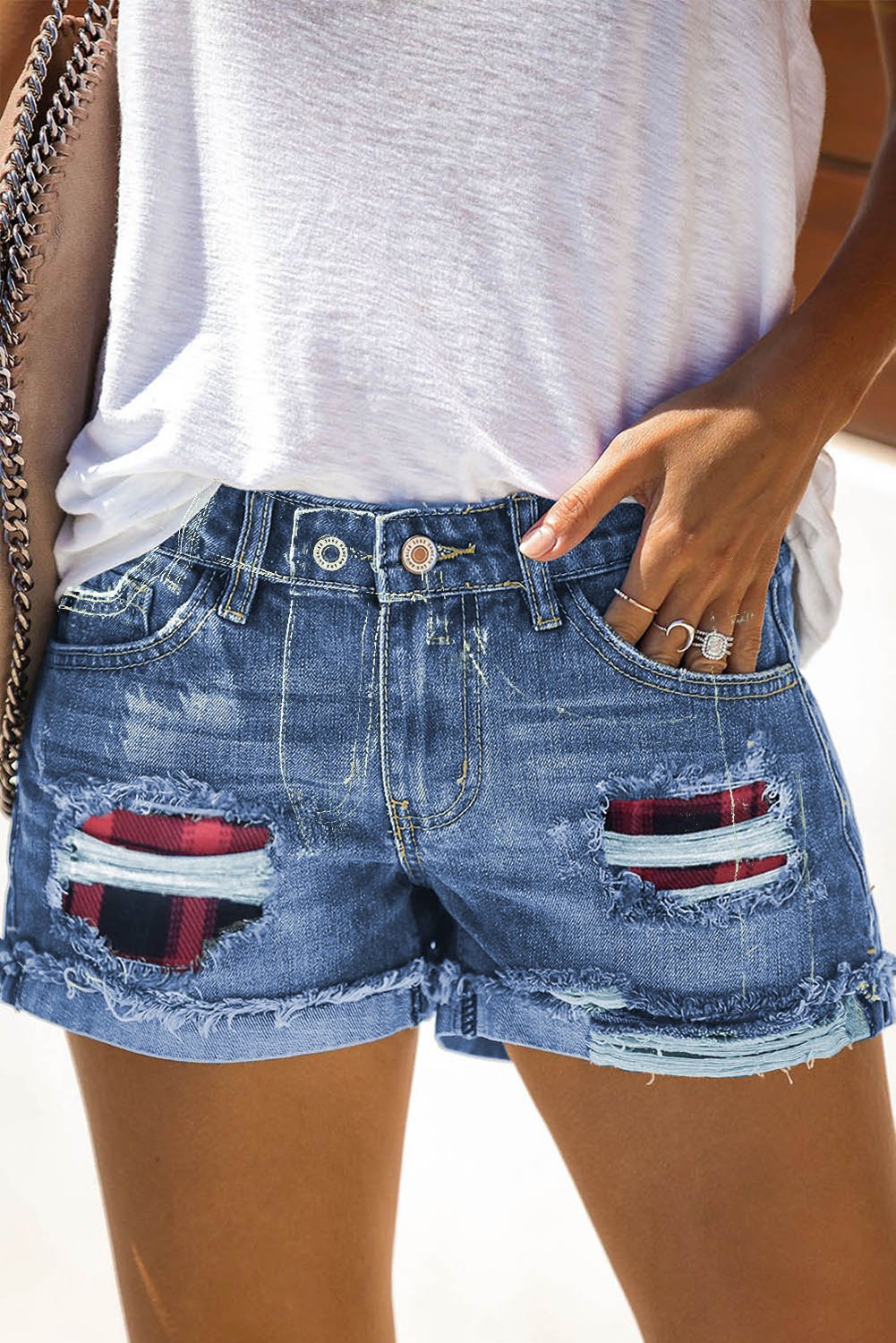 Women's Blue Red Plaid Patchwork Rolled Hem Denim Shorts featuring distressed detailing and a mid-rise relaxed fit, perfect for summer wear.