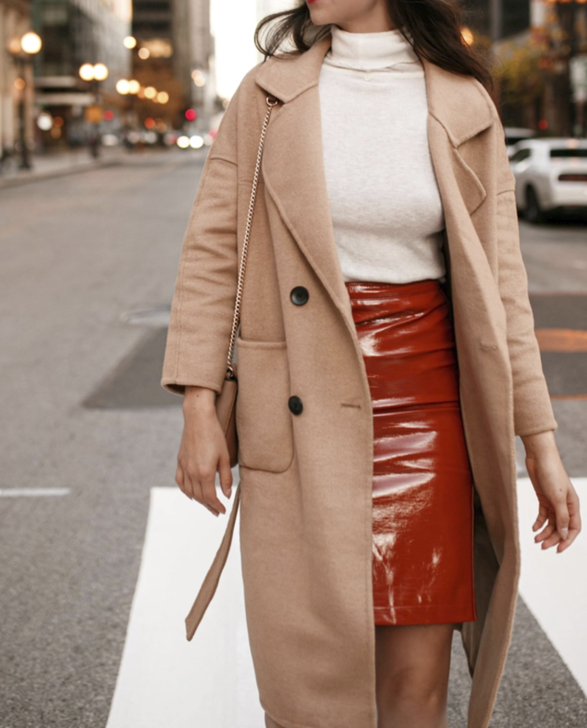 Berlin Rock ‘n’ Roll Vinyl Skirt in burnt orange, made of vegan leather with a concealed side zip and back slit for ease of movement.