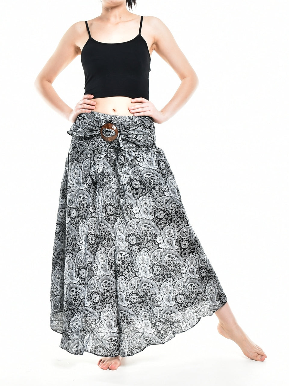 Bohotusk Black Orbit Long Skirt featuring a coconut buckle and smocked waist, styled as a strapless dress.