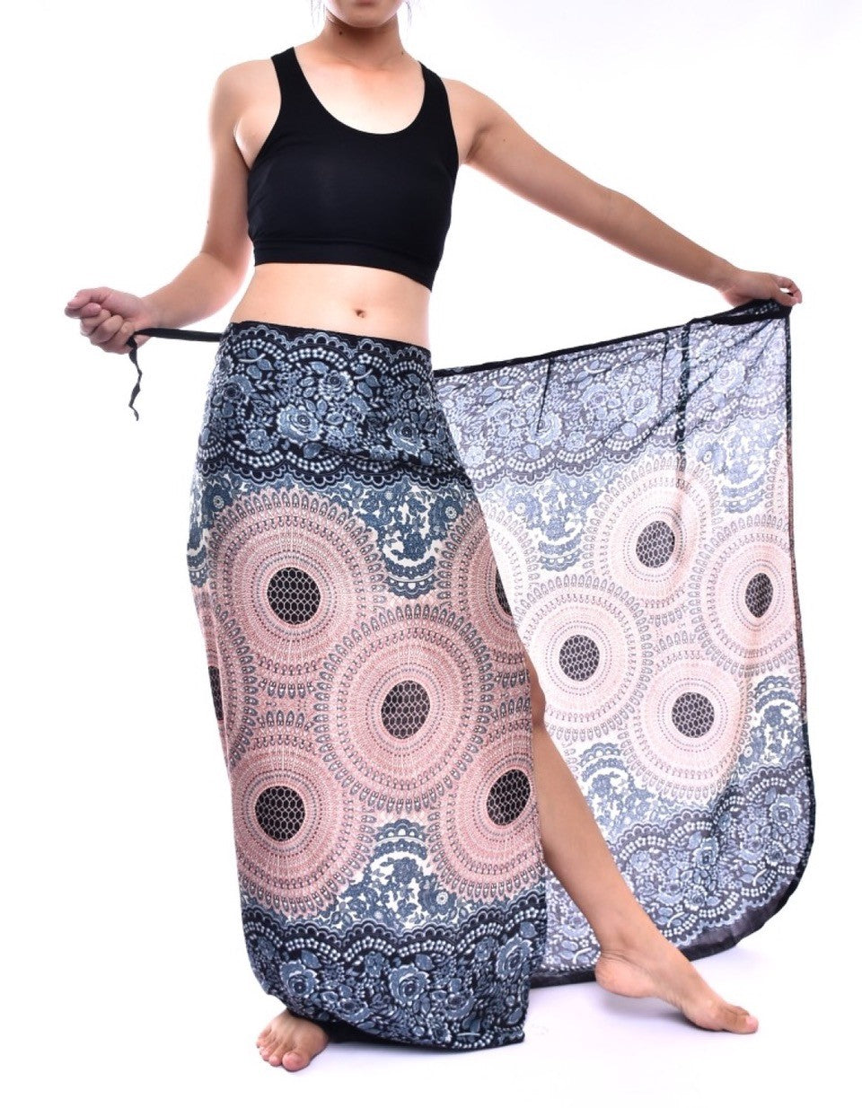 Bohotusk Light Pink & White Sun Glow Sarong displayed elegantly, showcasing its soft fabric and tie waist design.