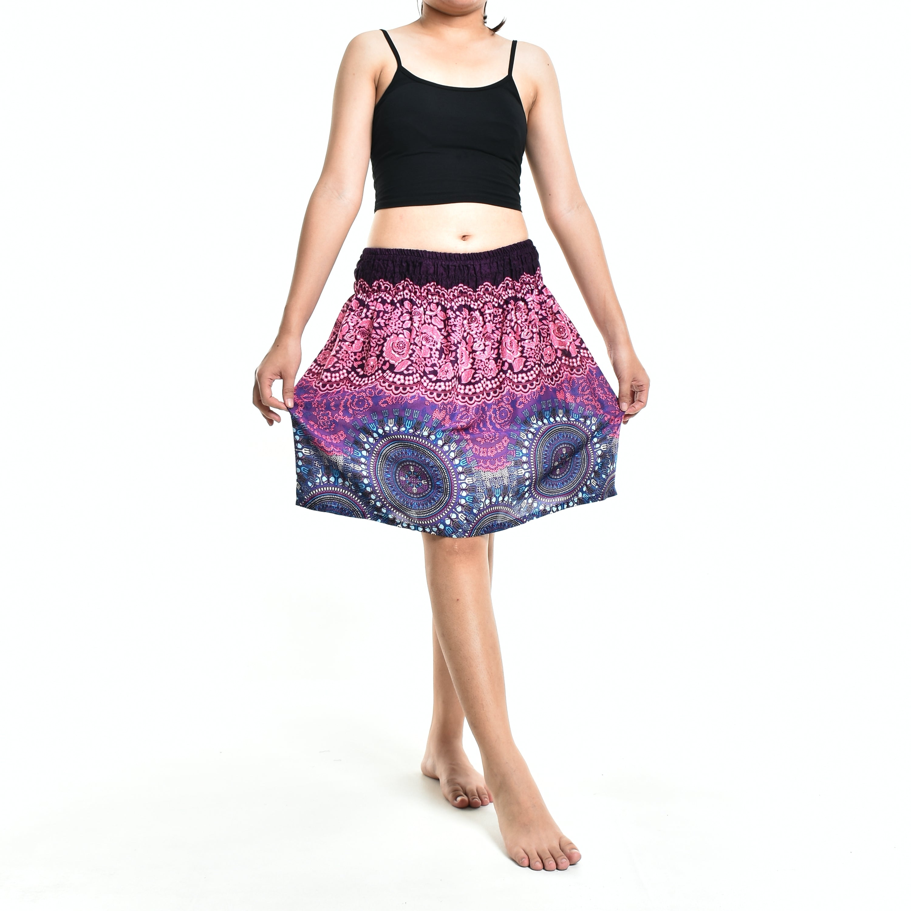 Bohotusk Pink Blue Sun Glow Print Short Skirt hanging on a display, showcasing its vibrant colors and elasticated waist.