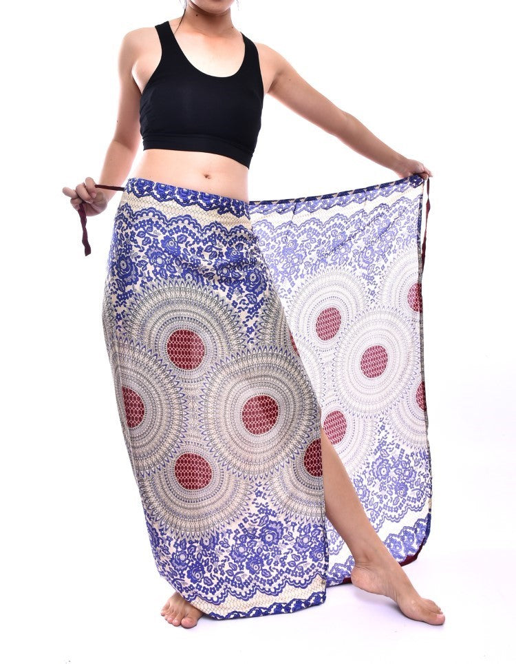 Bohotusk Sky Blue Garden Swirl Sarong, featuring a vibrant design and soft fabric, ideal for beachwear and versatile styling.