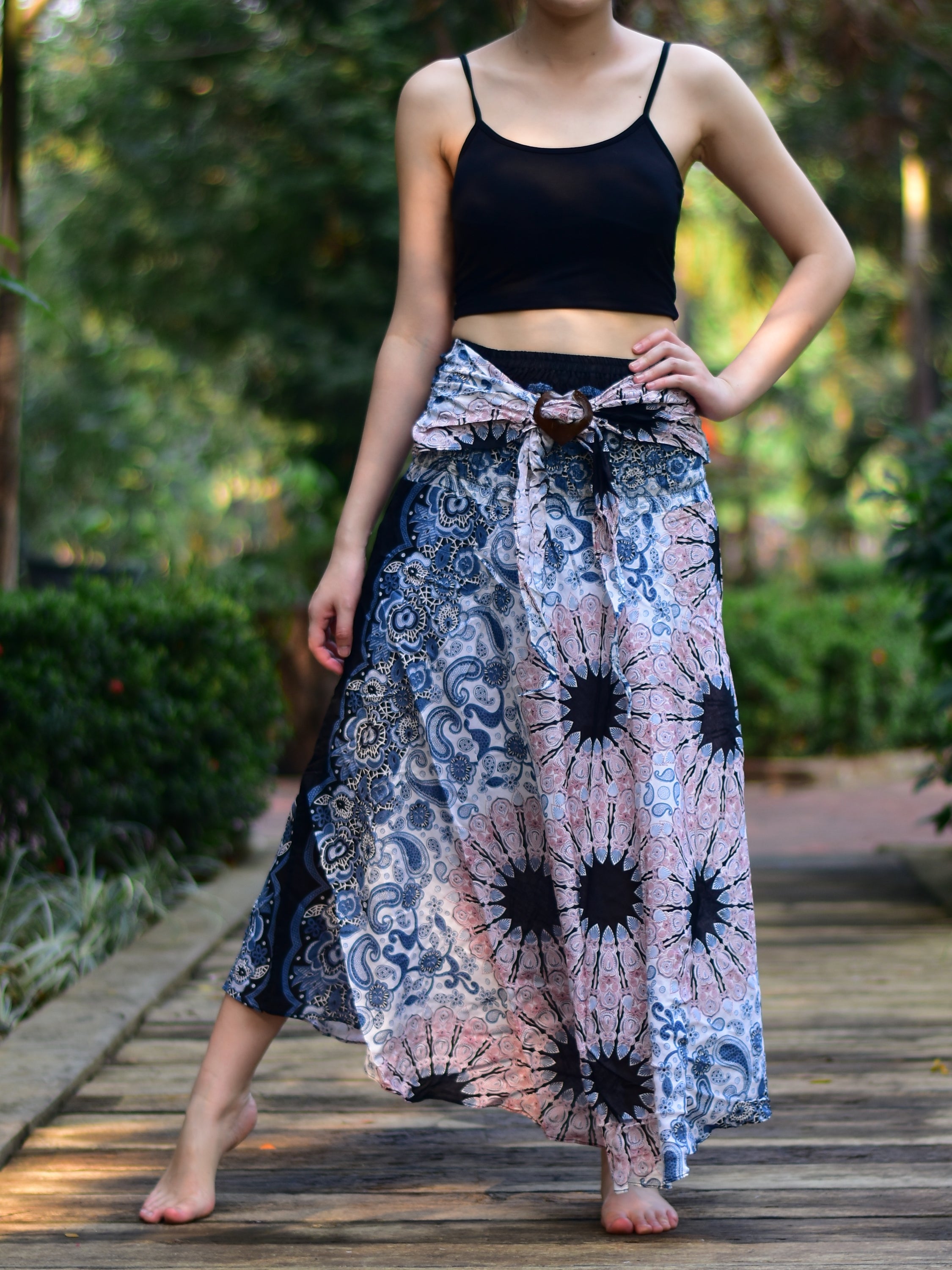 Bohotusk White Pink Ink Splash Long Skirt featuring a coconut buckle and elasticated smocked waist, perfect for versatile styling.