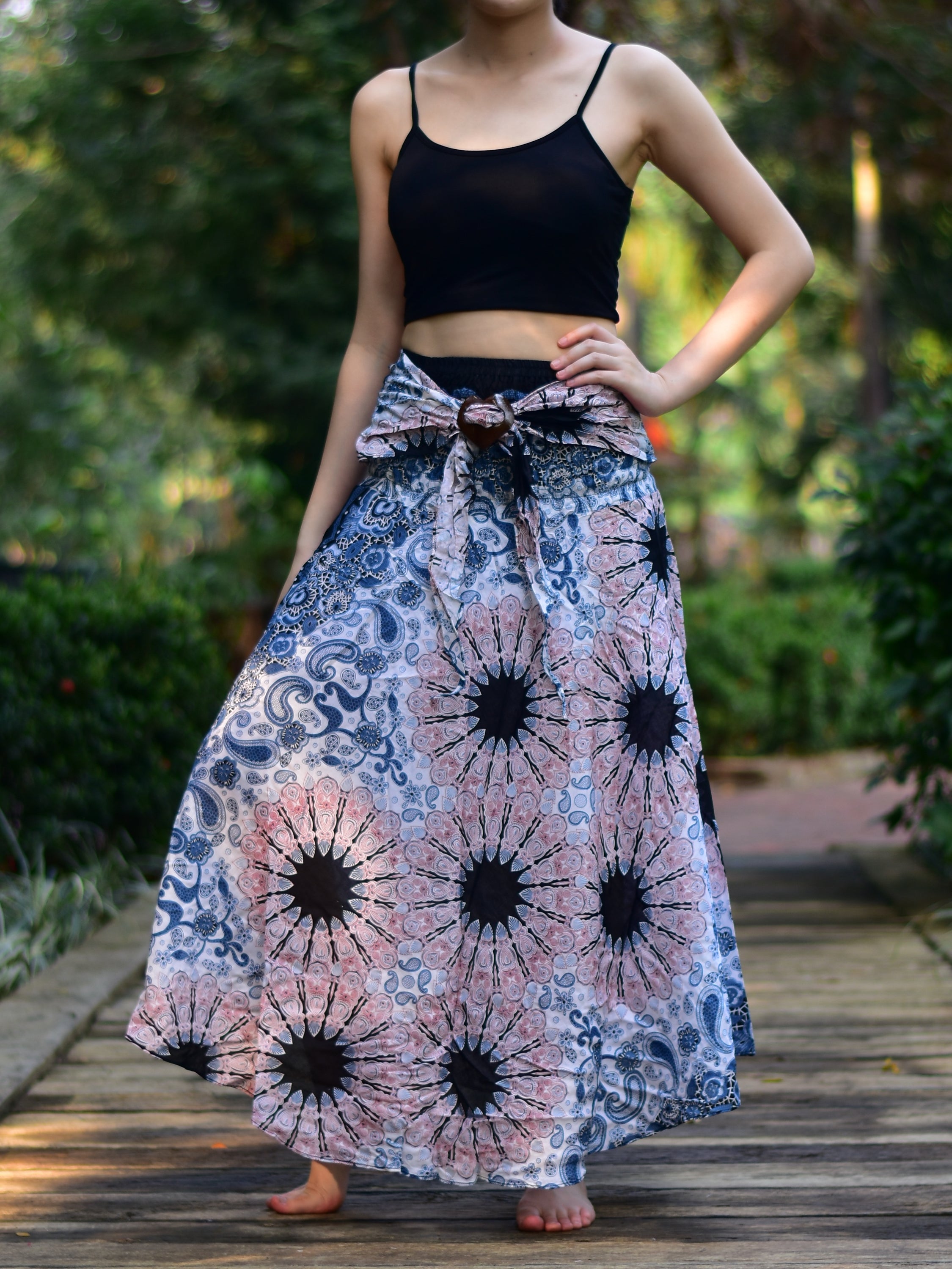 Bohotusk White Pink Ink Splash Long Skirt featuring a coconut buckle and elasticated smocked waist, perfect for versatile styling.