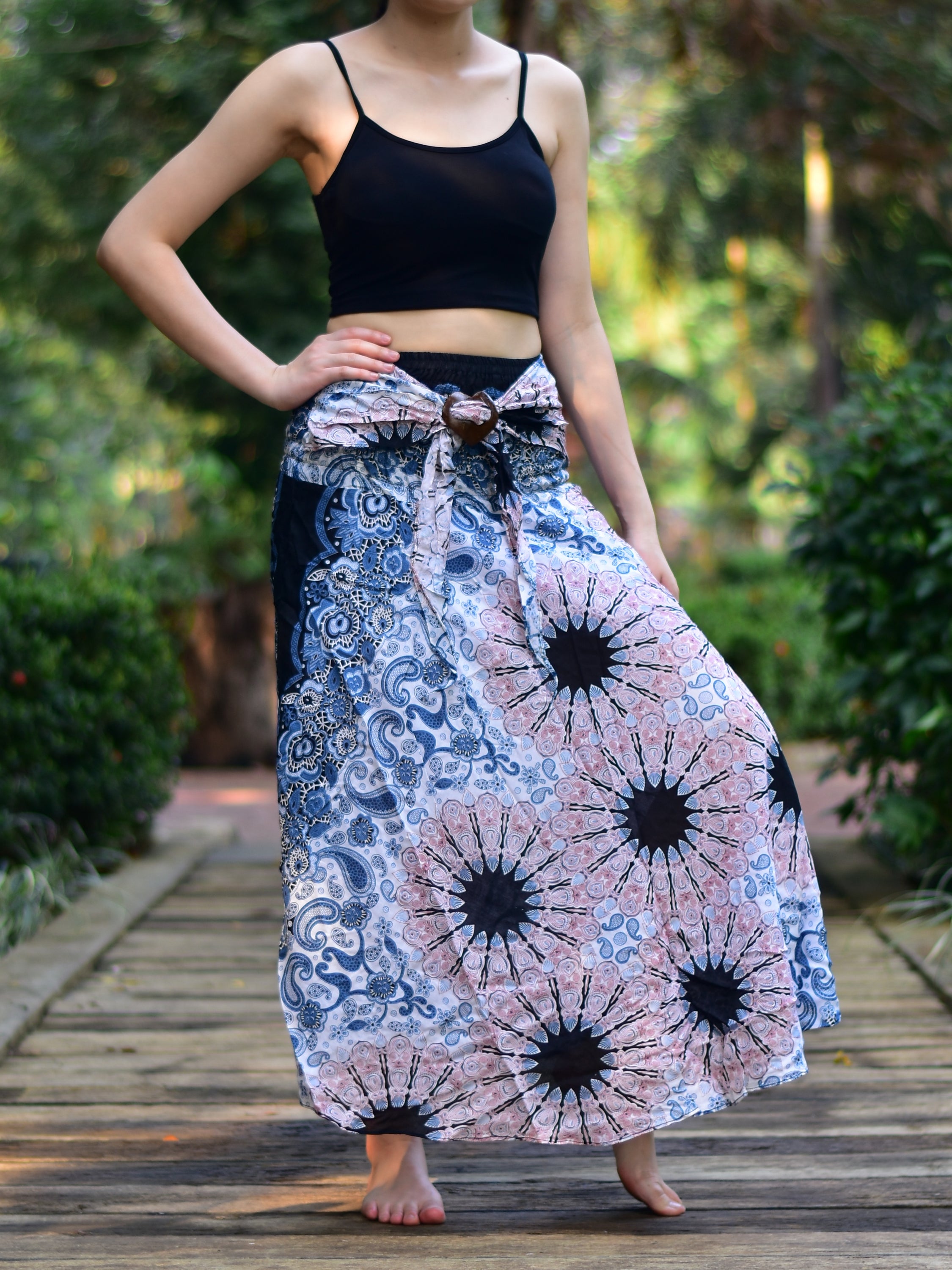 Bohotusk White Pink Ink Splash Long Skirt featuring a coconut buckle and elasticated smocked waist, perfect for versatile styling.